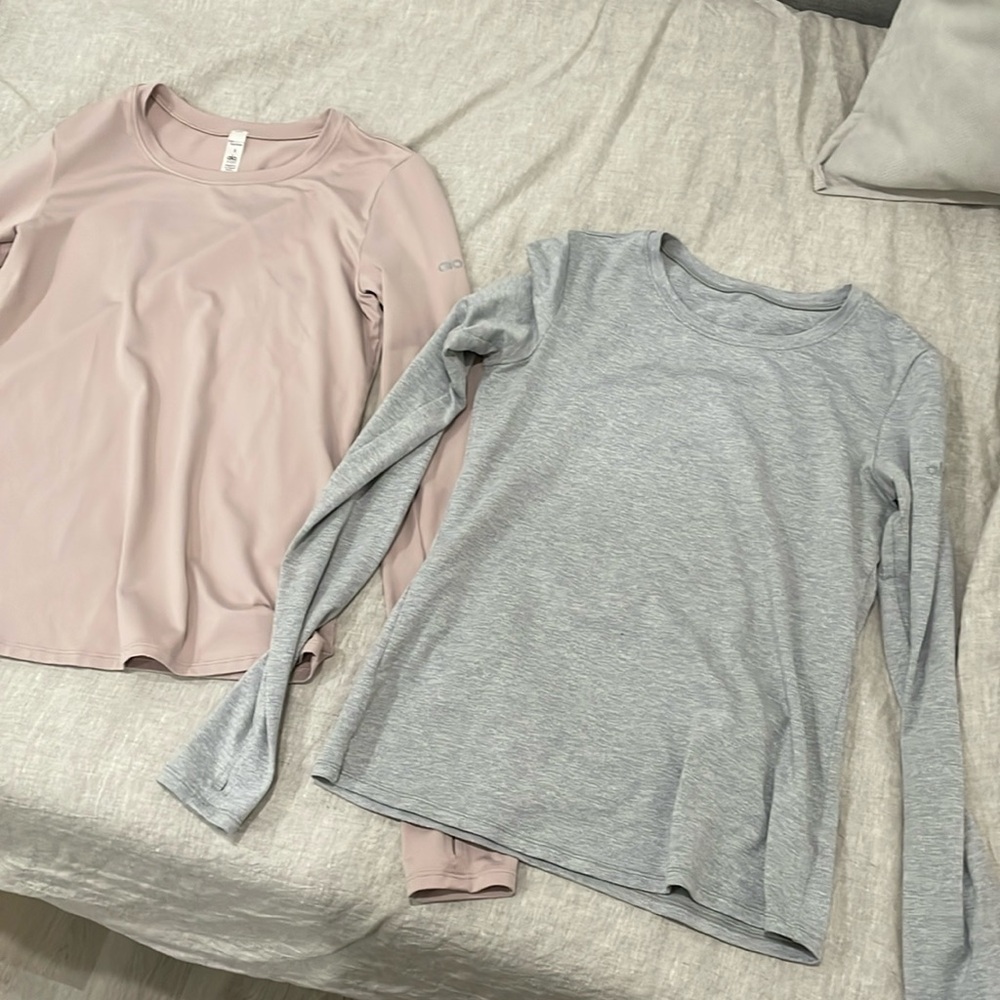 Two pack like new Alo long sleeve performance workout shirts.